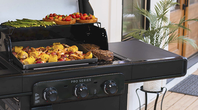 Charbroil Grill sitting on a patio with patio furniture